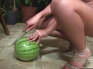Big titty tgirl gets a melon workout before jerking off